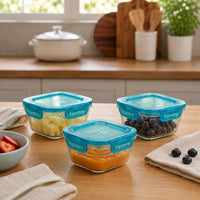 Side view of Frigoverre Evolution 2-Cup Square Glass Food Storage Container, Teal Lid (Set of 3)
