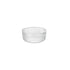 A clear round Exclusiva glass serving bowl with a multifaceted texture.